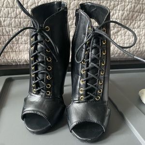 Charlotte Russe peep toe lace up heel booties. US 6